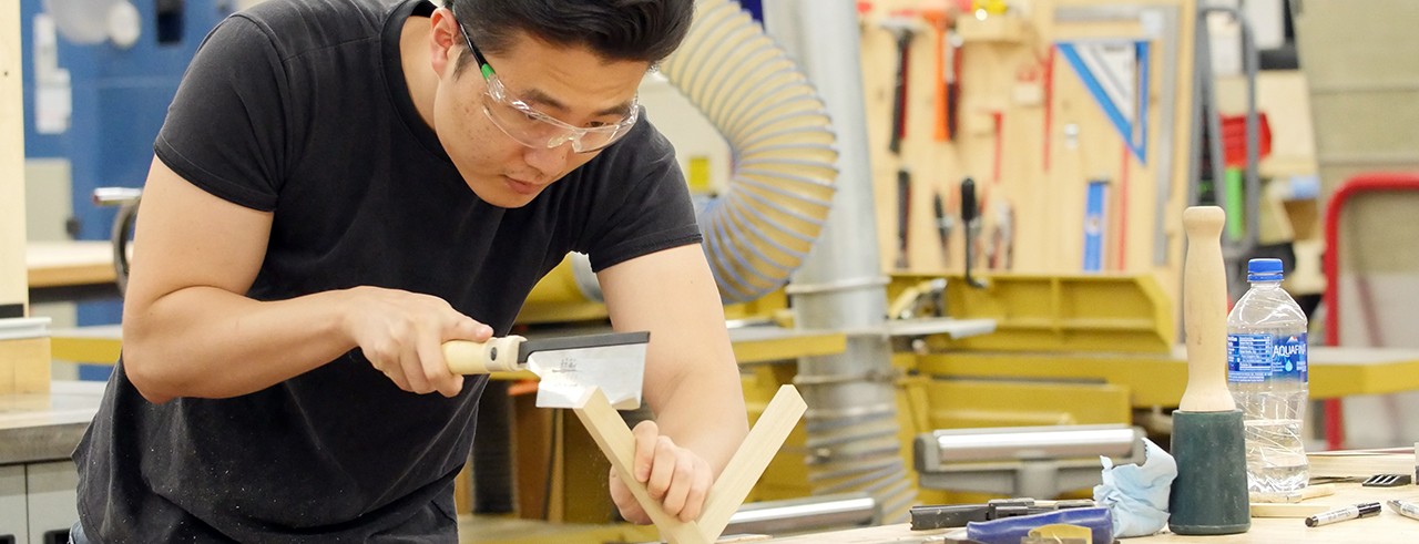 student working in the maker space